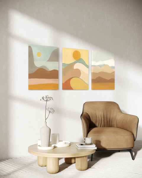 a living room with two paintings on the wall