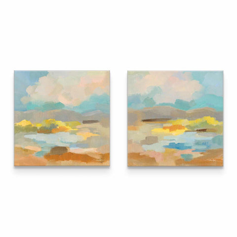 a pair of paintings of a landscape