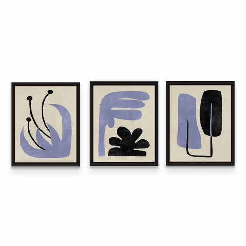 three abstract paintings hanging on a wall