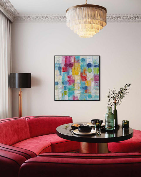 a living room filled with furniture and a painting on the wall