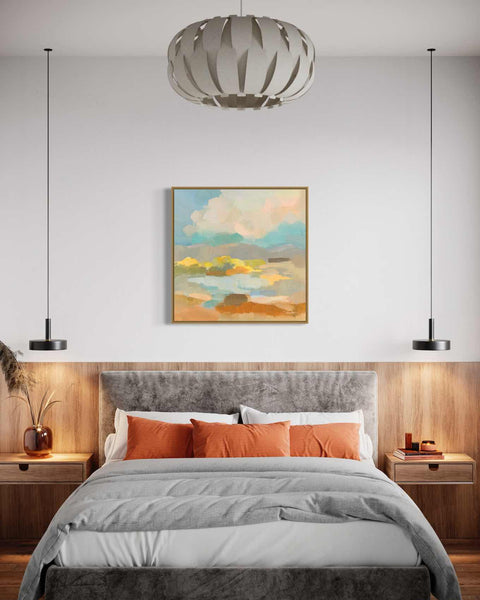 a bedroom with a large bed and a painting on the wall