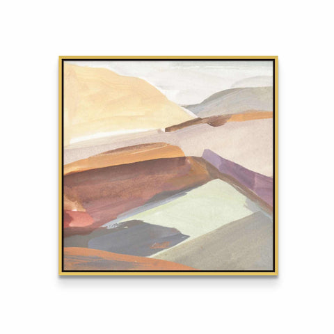 a painting with a gold frame hanging on a wall