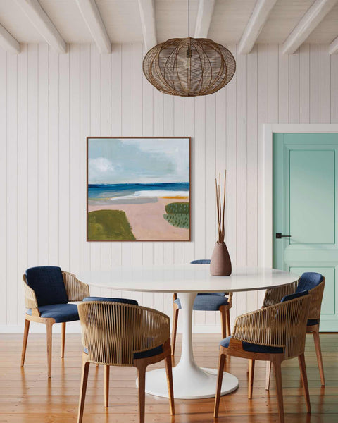 a dining room with a table and chairs