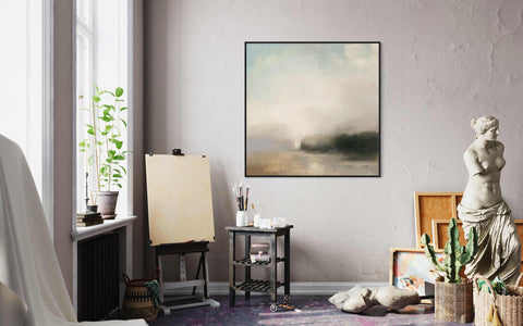 a living room filled with furniture and a painting on the wall