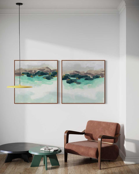 a living room with two paintings on the wall
