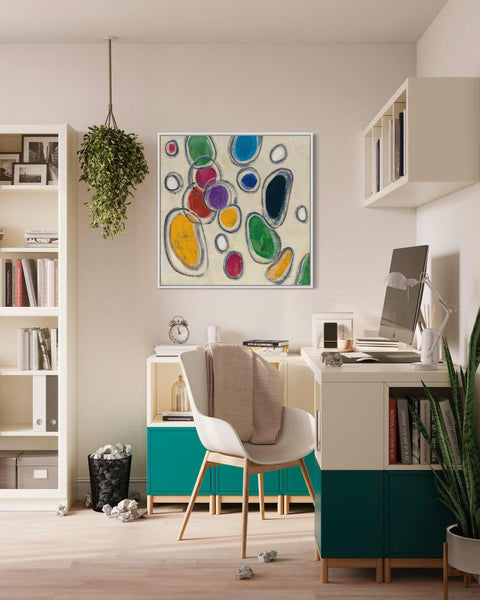 a room with a desk and a chair and a painting on the wall