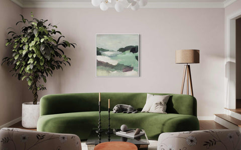 a living room filled with furniture and a painting on the wall