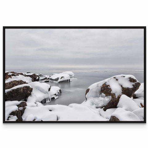 a picture of some rocks covered in snow
