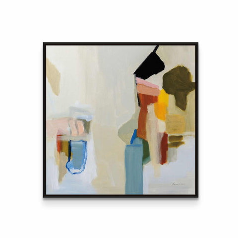 a painting with a black frame hanging on a wall