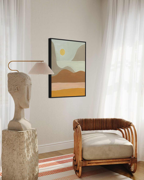 a living room with a couch, chair and a painting on the wall