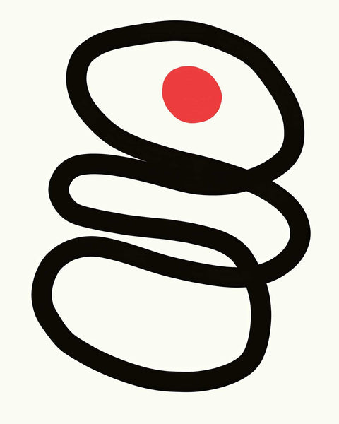 a black and white picture with a red dot in the center