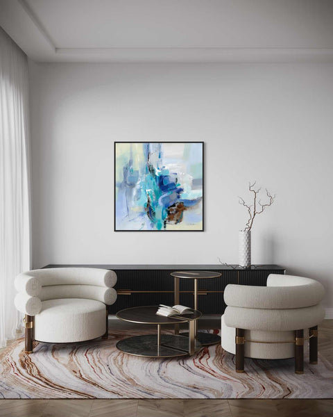 a living room with two chairs and a coffee table