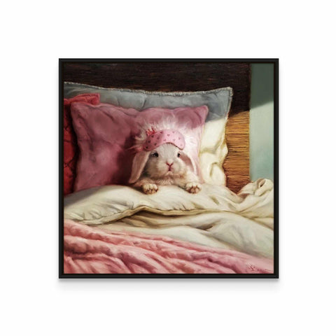 a picture of a cat laying on a bed
