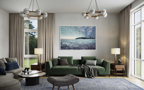 a living room filled with furniture and a painting on the wall