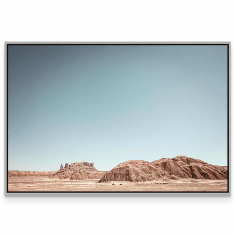 a picture of a desert with mountains in the background