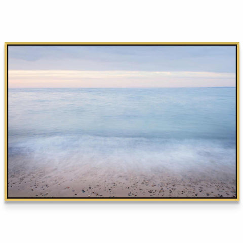 a picture of a beach with the ocean in the background