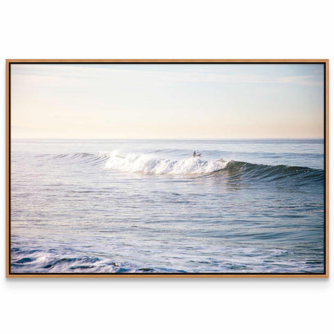 a picture of a surfer riding a wave in the ocean