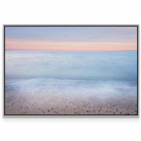 a picture of a beach with the ocean in the background