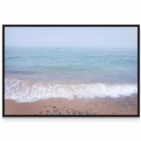 a picture of a beach with waves coming in