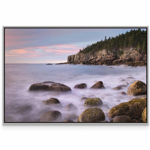 a picture of some rocks in the water