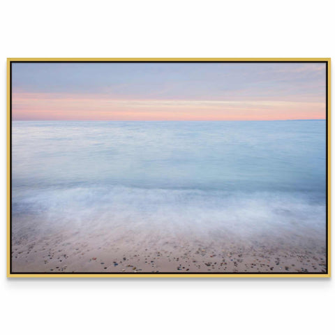 a picture of a beach with the ocean in the background