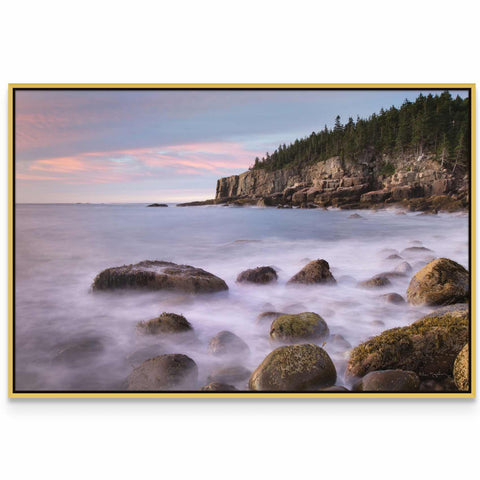 a picture of some rocks in the water