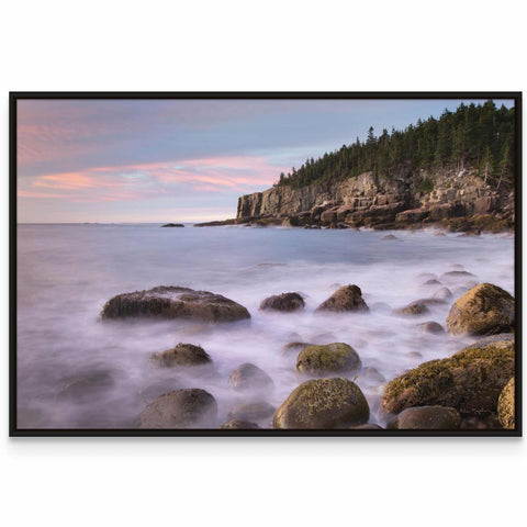 a picture of some rocks in the water