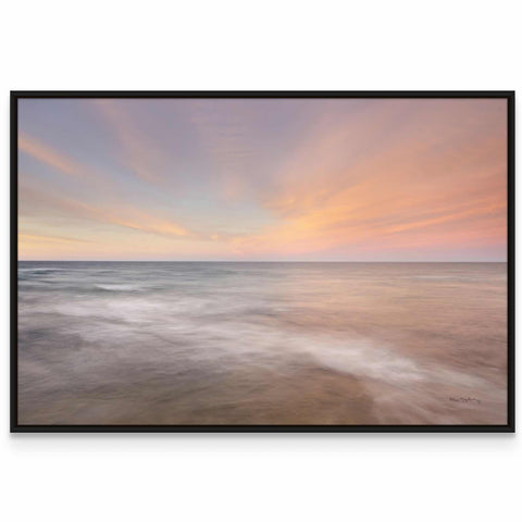 a picture of a sunset over the ocean
