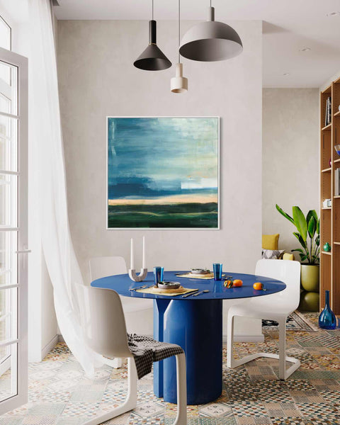 a dining room with a blue table and white chairs